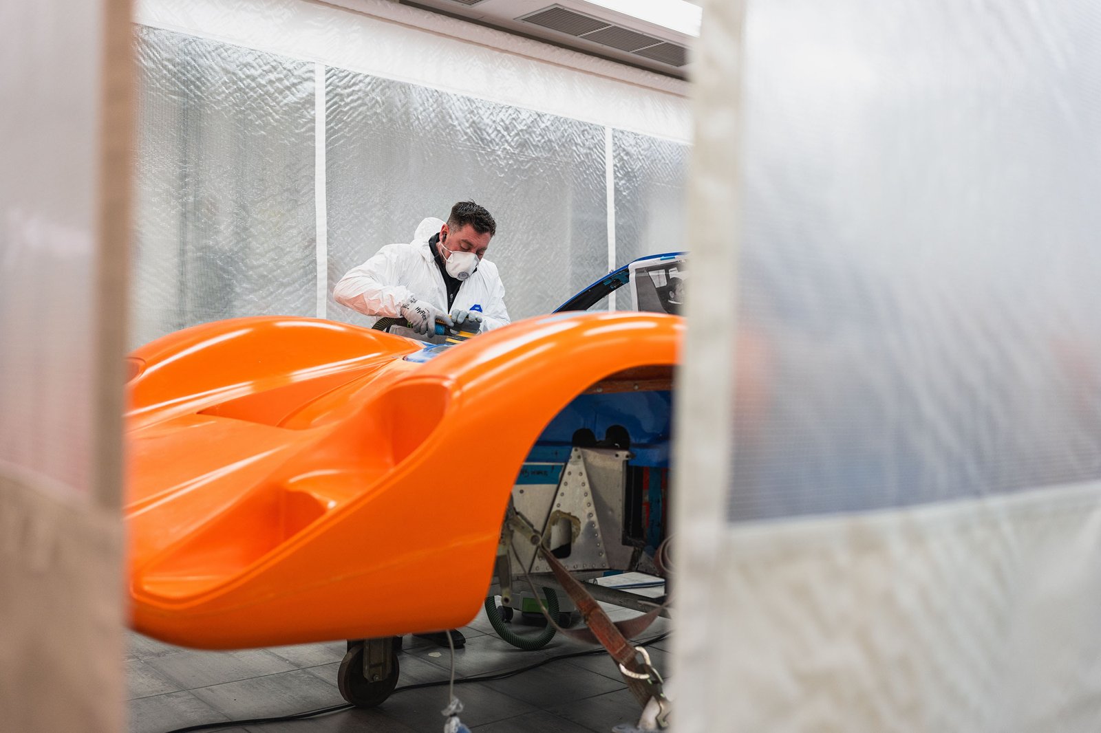 The M6GT's fibreglass body inside MSO's paint booth during the restoration.